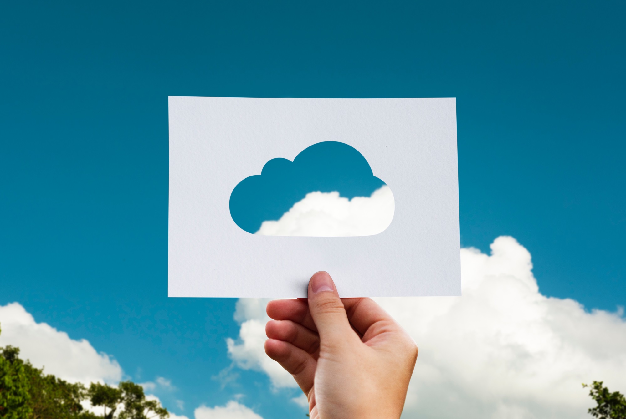 cloud person holding cut out of cloud