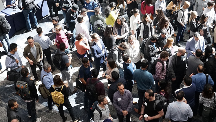 A crowd of people, photographed from above.